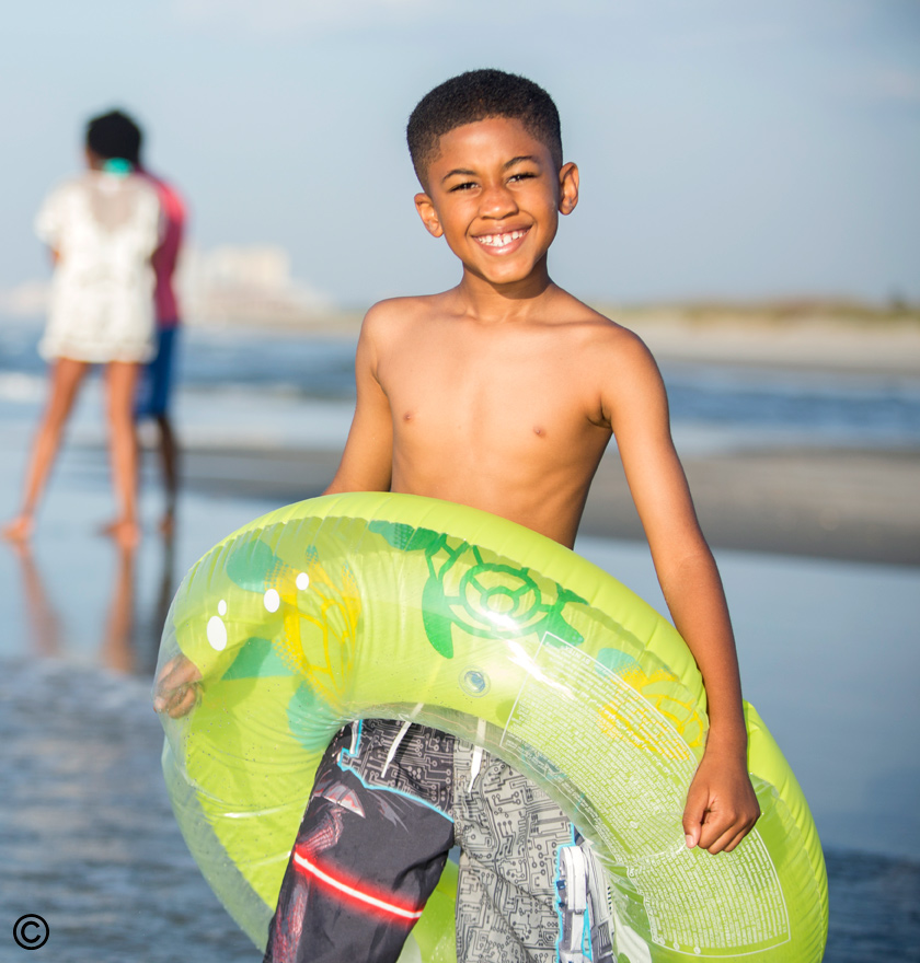Child enjoying summer at Ocean Creek Resort
