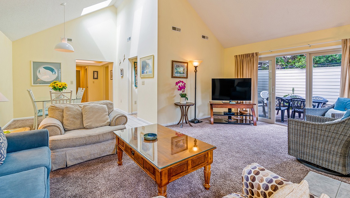 Living room with seating and TV